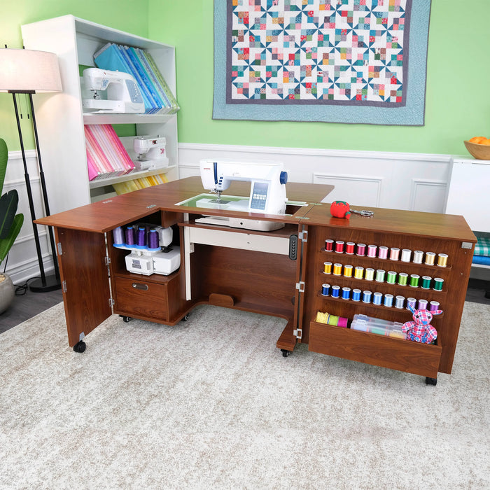 Wallaby Dual Rail Electric Sewing Cabinet in Teak fully opened with sewing machine and organized thread storage.