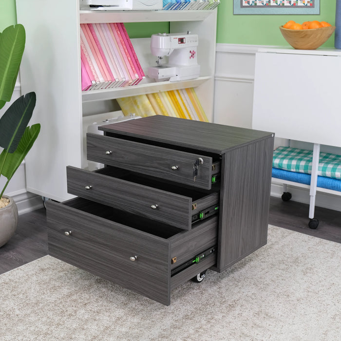 Kangaroo Joey Storage Cabinet in Gray K7807 shown with fully opened drawers inside a creative sewing studio, featuring smooth-glide storage compartments.