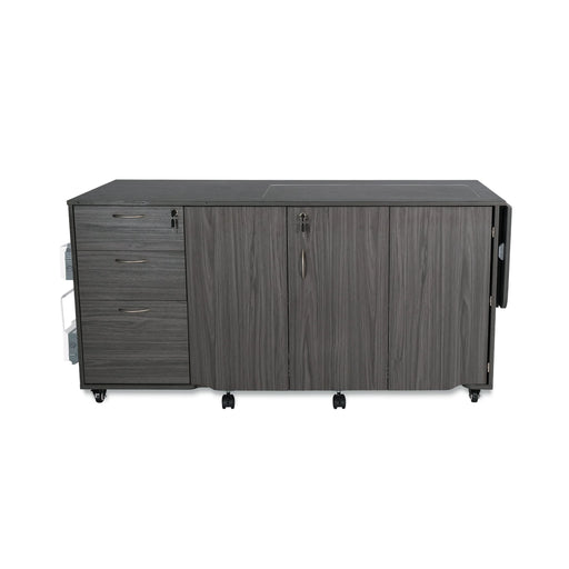 Kangaroo Sydney Electric Sewing Cabinet closed in compact form, gray wood finish sewing furniture with locking drawers and caster wheels.