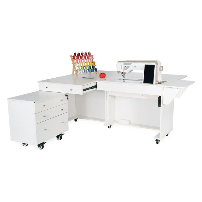 Kangaroo & Joey XLE Electric Sewing Cabinet in Ash White with extended workspace, sewing machine installed, and rolling storage drawers.