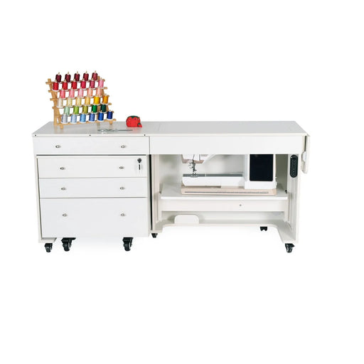 Front view of Kangaroo & Joey XLE Electric Sewing Cabinet showing sewing machine storage bay and three-drawer Joey unit in Ash White.