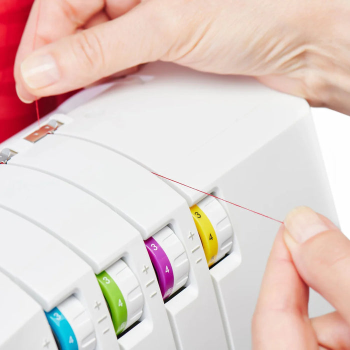 Easy View Threading system on SINGER SE017 Elite serger with color-coded tension dials for simplified looper threading