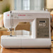 SINGER Brilliance 6180 sewing machine on tabletop showing digital display and modern home sewing setup
