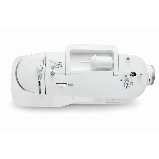 Top view of SINGER Elite CE677 sewing machine showing built-in carrying handle, bobbin winding system, and threading guide details