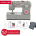 SINGER Heavy Duty 4452 sewing machine with included accessories and presser feet kit displayed below the machine